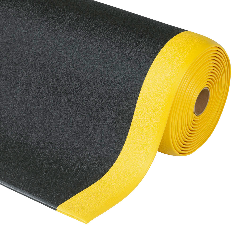 Espuma de vinilo con superfície estructurada, color negro con bandas de seguridad amarillas.