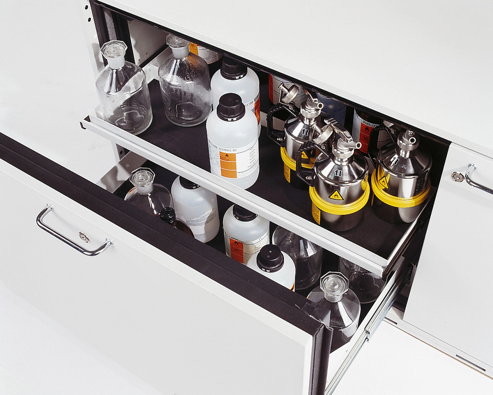 Slide-out sumps lockable in any position allow easy storage of containers